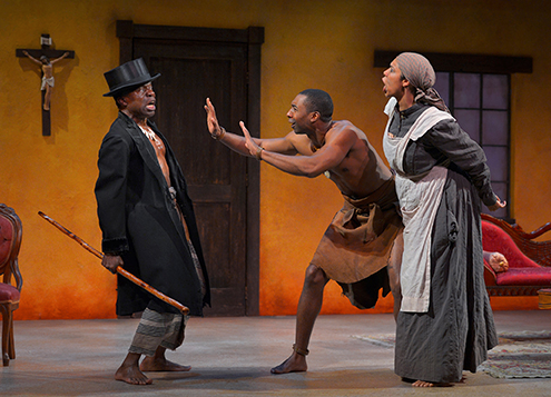 (from l to r) L. Peter Callender as Uncle, JaBen Early as Tamba, and Elizabeth Carter as Mai Tamba in Danai Gurira's "The Convert". Photo Credit: Kevin Berne.